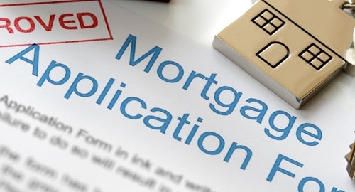 Mortgage application form with approved stamp